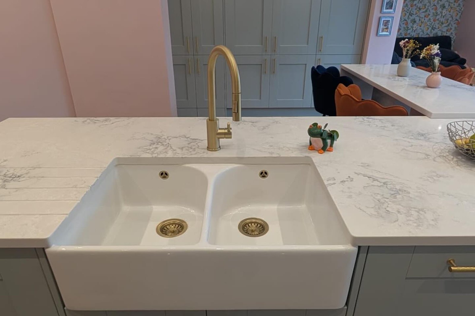Double belfast sink with a brass tap