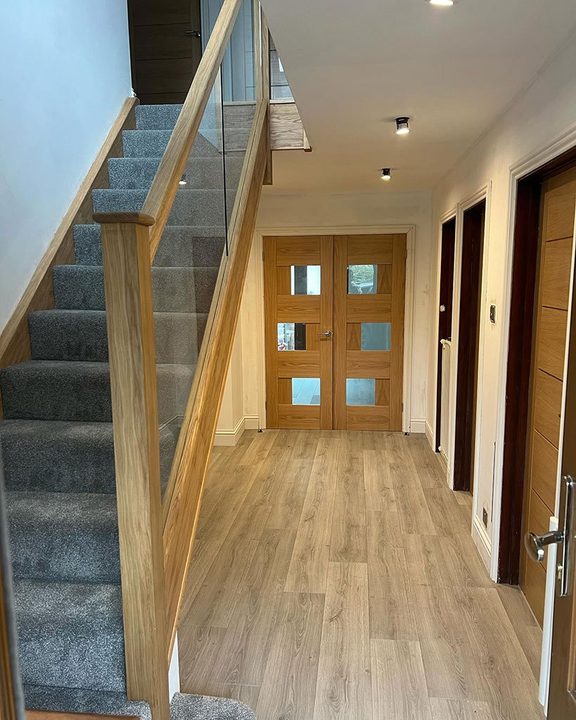 New oak staircase with black metal spindles