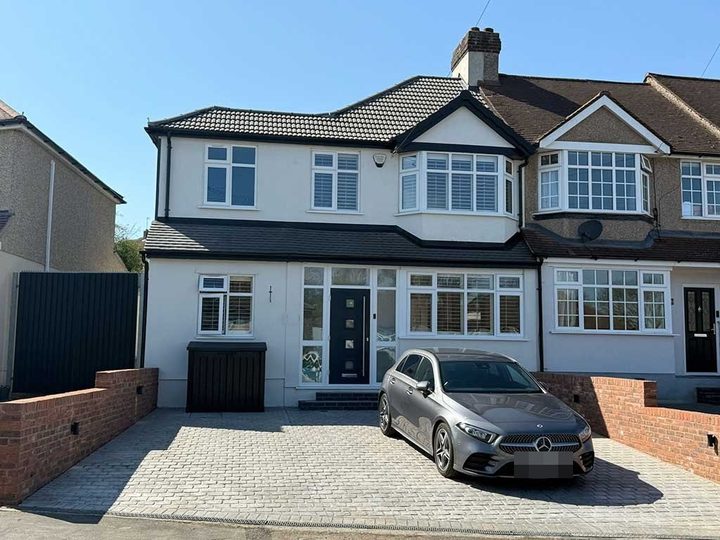 New block paved driveway at the front of a house
