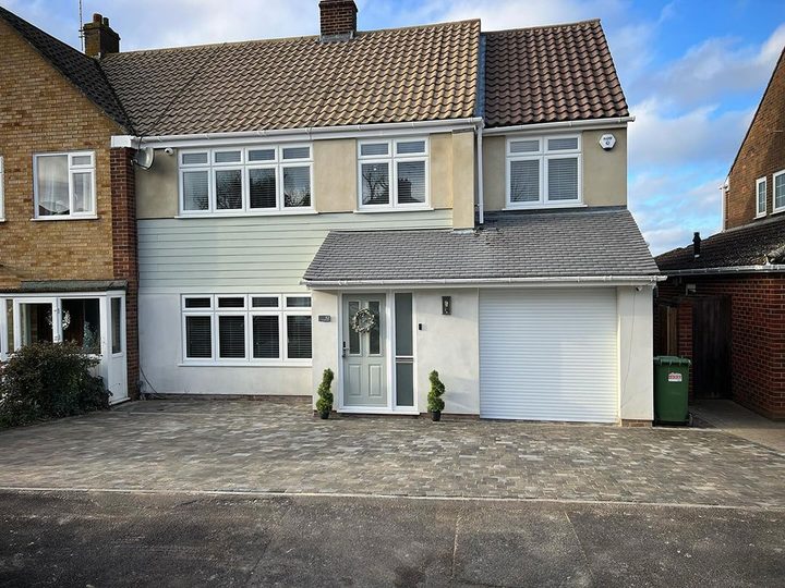Side extension and garage alongside the original house