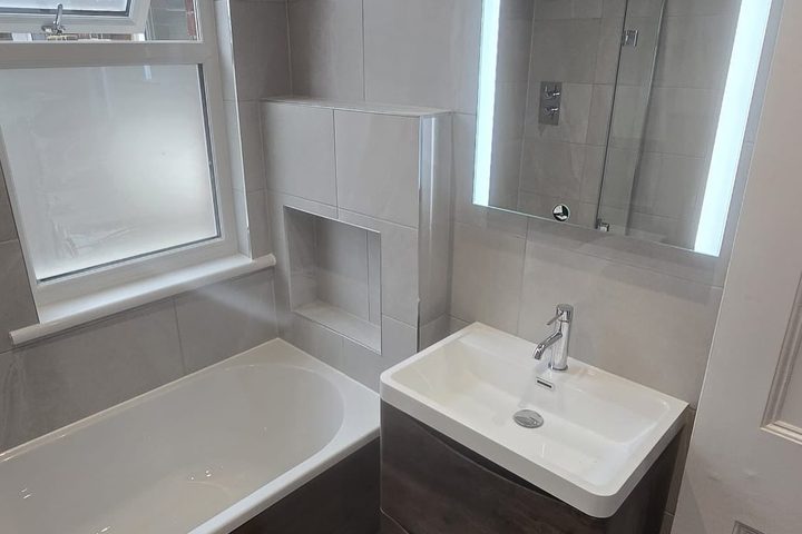 Bathroom vanity and shower after refurbishment