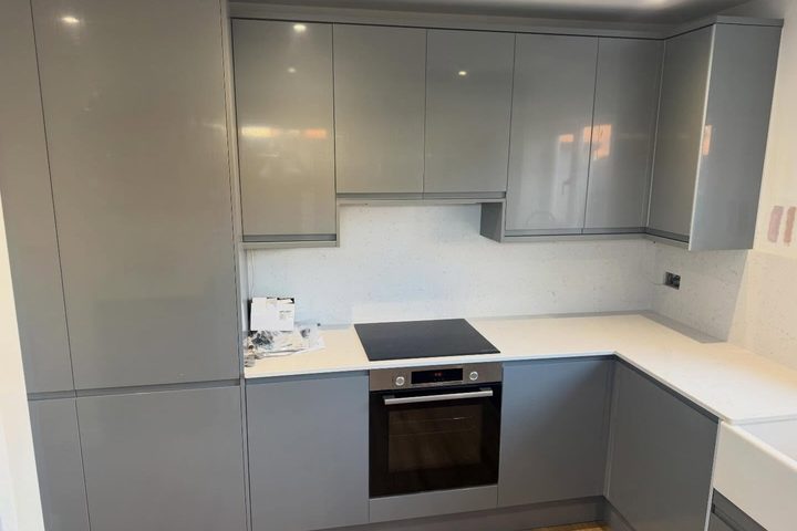 Refitted grey gloss kitchen