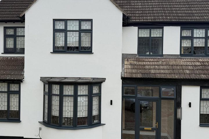 House exterior finished in smooth white render