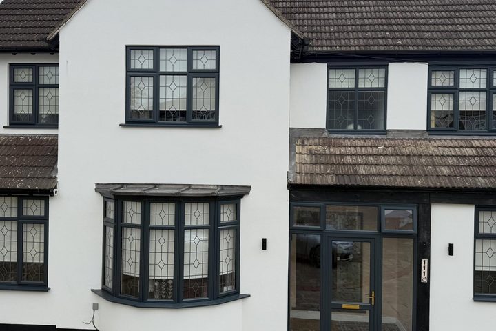 House front after new silicone render and resprayed windows