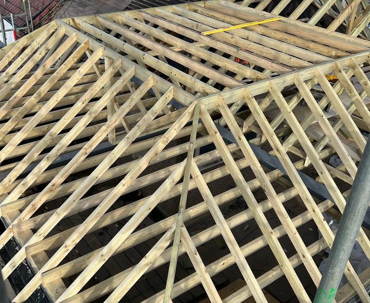 New timber floor structure and roof framing inside a loft