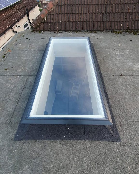 Glazed roof lantern set into a new flat roof